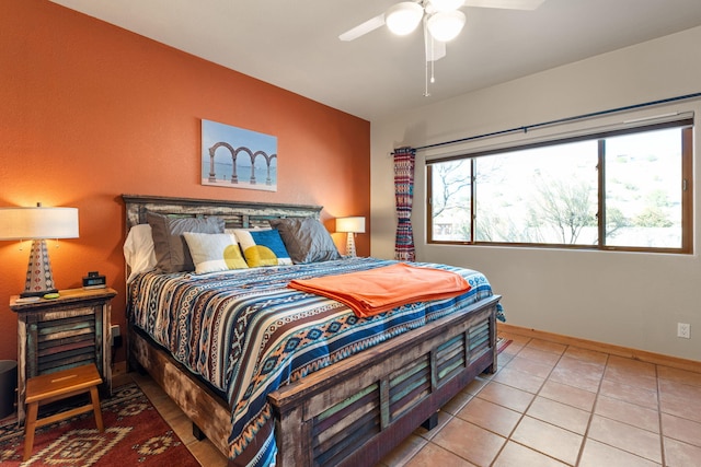 tiled bedroom with ceiling fan