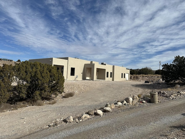 view of adobe home