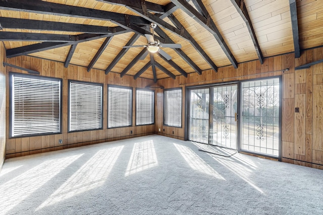 unfurnished sunroom featuring wood ceiling, lofted ceiling with beams, and ceiling fan