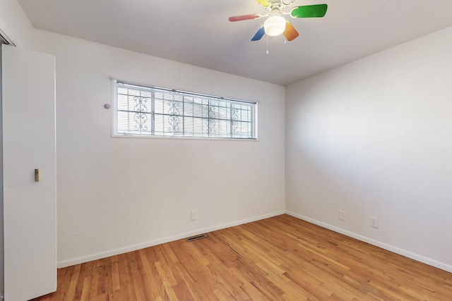 unfurnished room featuring ceiling fan and light hardwood / wood-style floors