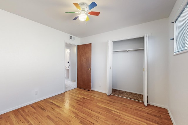 unfurnished bedroom with ceiling fan and light hardwood / wood-style floors