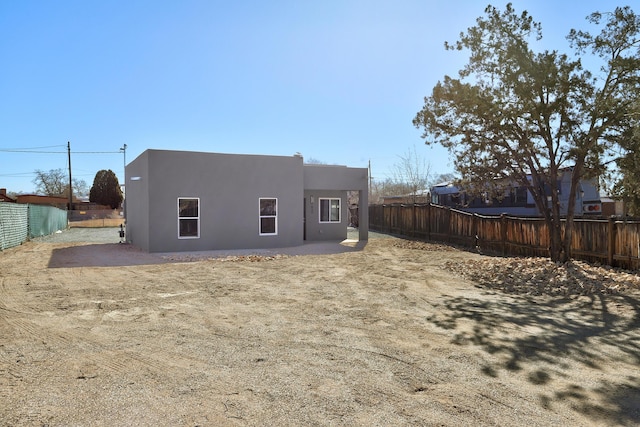 back of house featuring a patio