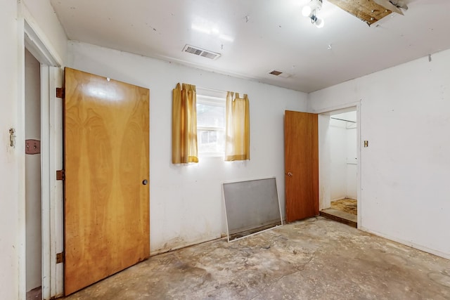 empty room with concrete floors