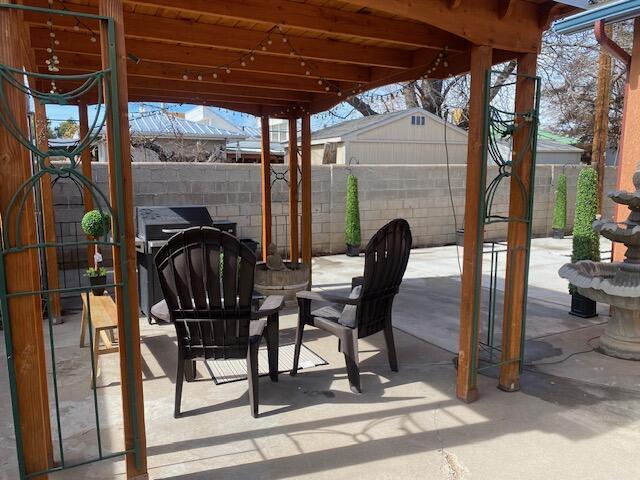 view of patio with fence