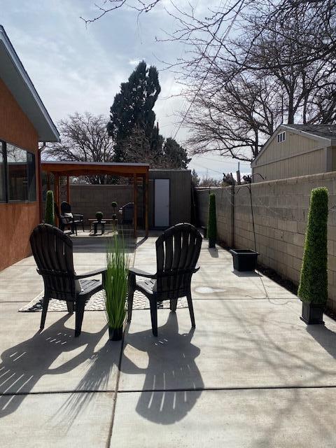 view of patio / terrace with a fenced backyard and a wooden deck