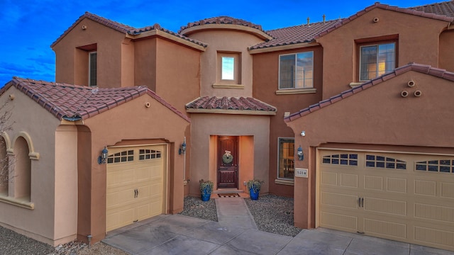 mediterranean / spanish-style house featuring stucco siding