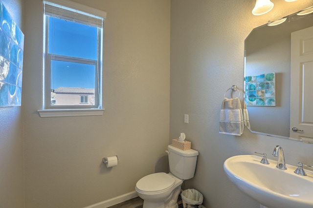 bathroom with sink and toilet