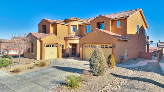 mediterranean / spanish-style house featuring a garage