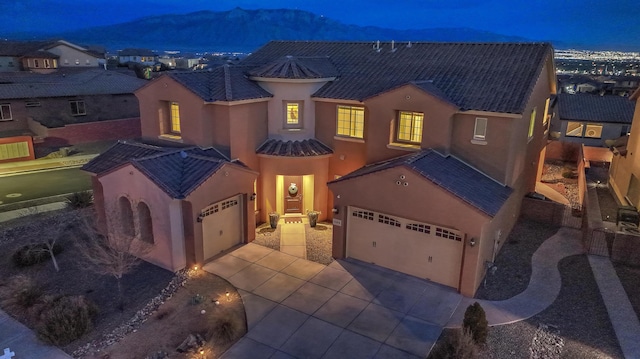 view of front of home with a mountain view