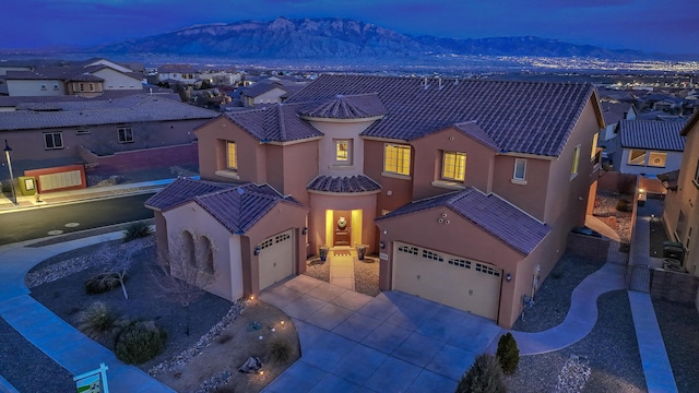 aerial view at dusk with a mountain view