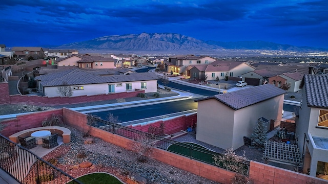 drone / aerial view featuring a mountain view