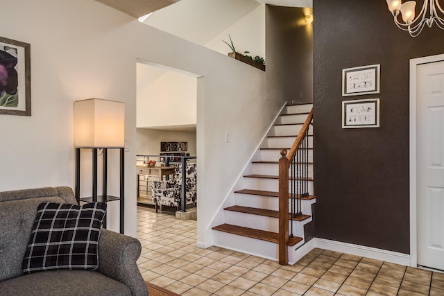 stairs with tile patterned flooring and a notable chandelier