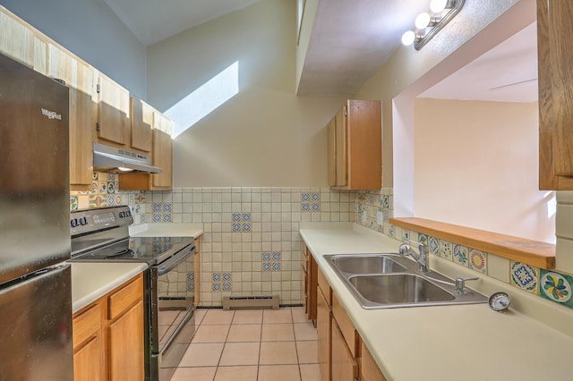 kitchen featuring sink, tile walls, light tile patterned floors, black / electric stove, and fridge