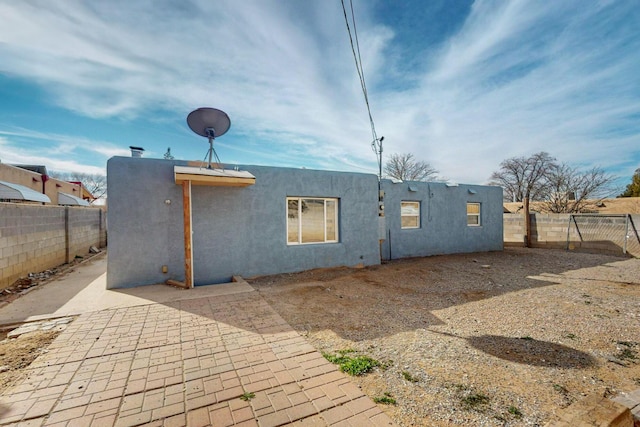 back of house featuring a patio area