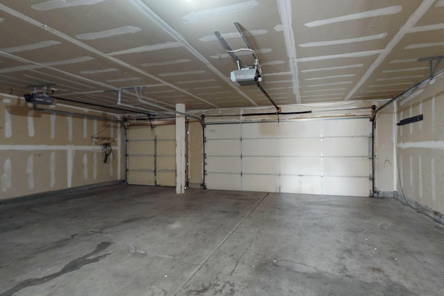 garage featuring a garage door opener