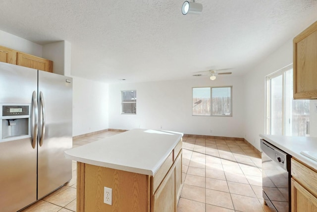 kitchen with light tile patterned flooring, light brown cabinetry, dishwashing machine, a center island, and stainless steel refrigerator with ice dispenser