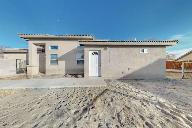 rear view of property with a patio