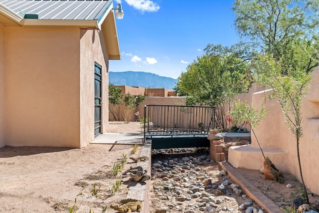 view of patio featuring a mountain view