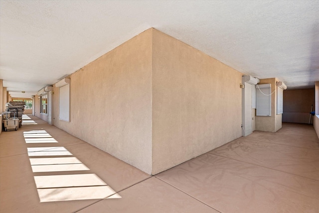 interior space with a textured ceiling