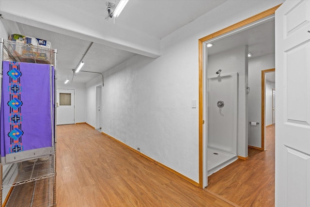 basement with wood-type flooring