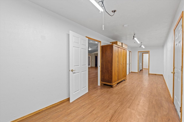 empty room with light wood-type flooring