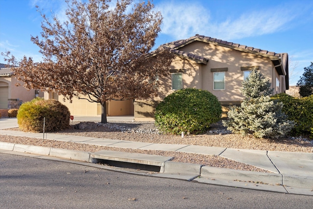 view of front of home featuring a garage