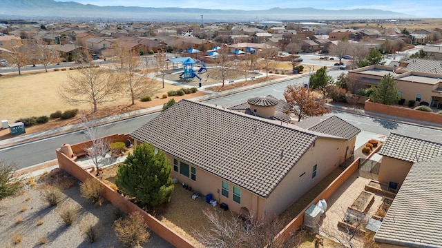 birds eye view of property featuring a mountain view