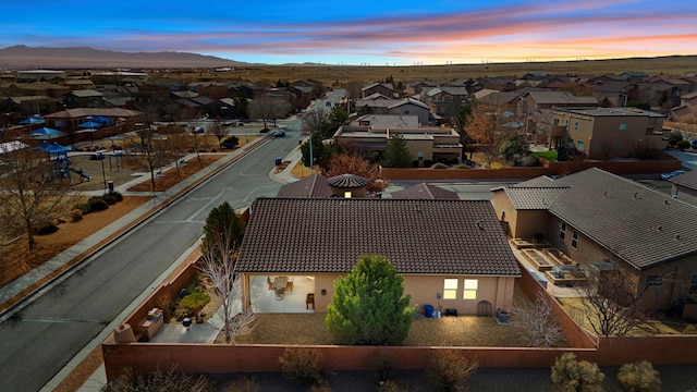 aerial view at dusk with a mountain view