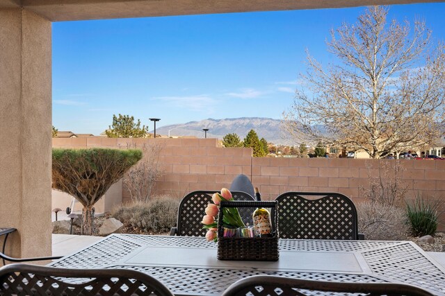 view of patio featuring a mountain view