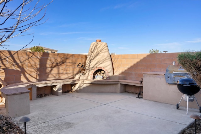 view of patio / terrace featuring a grill