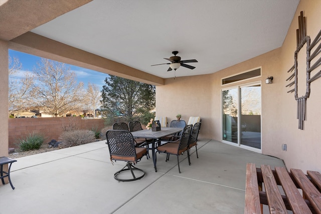 view of patio featuring ceiling fan