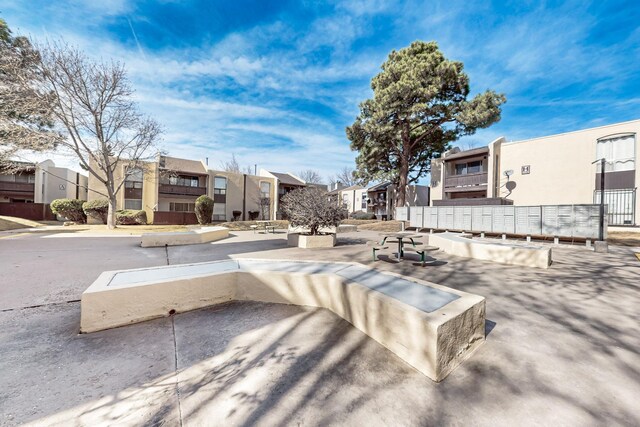 view of patio with mail boxes