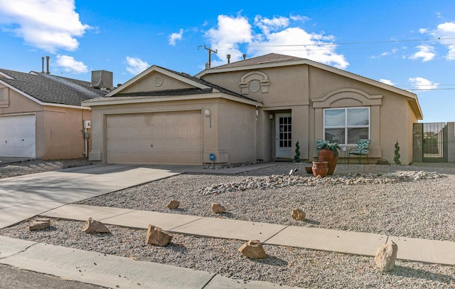 single story home with a garage