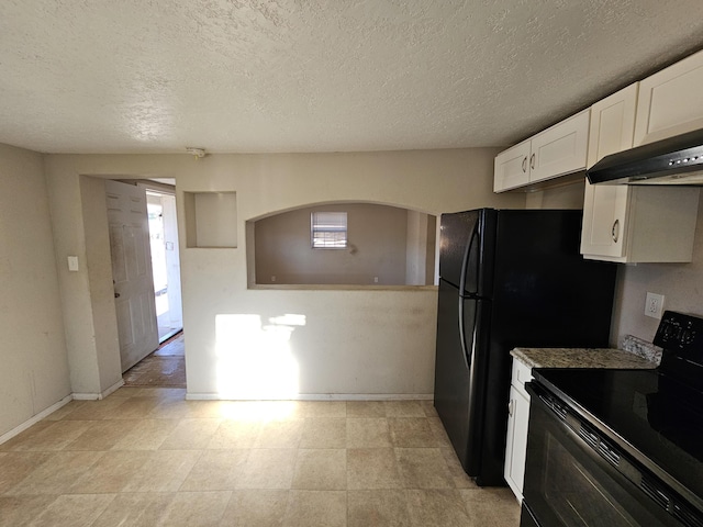 kitchen with white cabinetry, electric range, and a textured ceiling