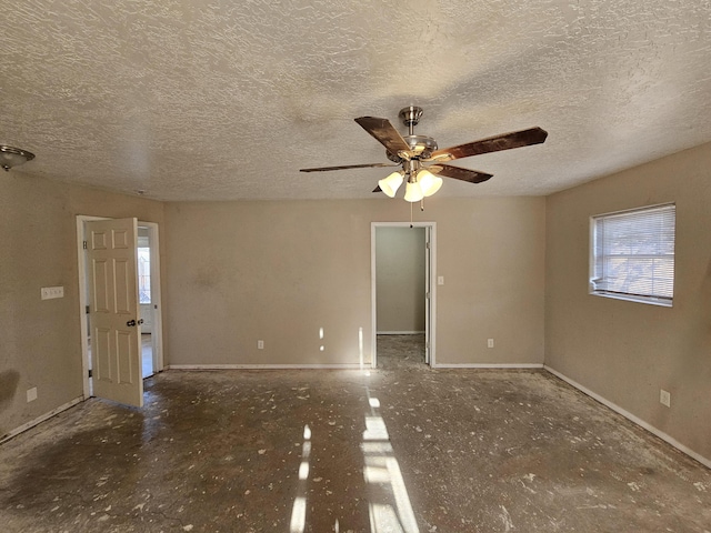 spare room featuring a textured ceiling