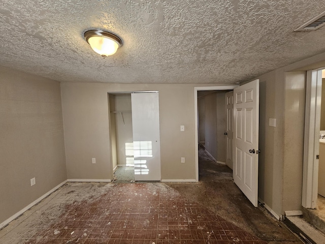 unfurnished bedroom with a closet