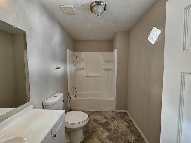 full bathroom with shower / washtub combination, vanity, a textured ceiling, and toilet