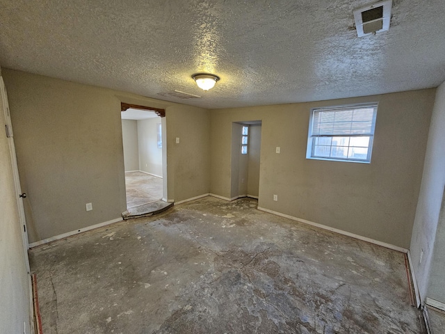 interior space featuring a textured ceiling