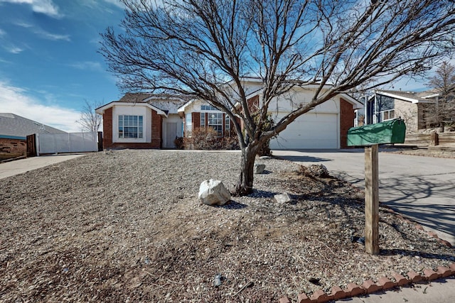 ranch-style house featuring a garage