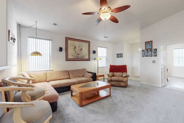 living room featuring ceiling fan and carpet flooring