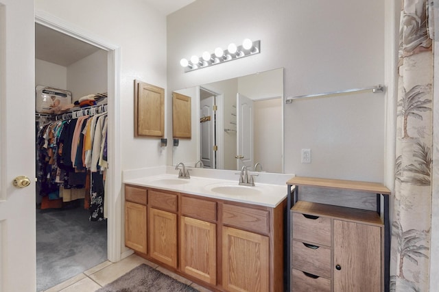 bathroom featuring vanity and tile patterned flooring