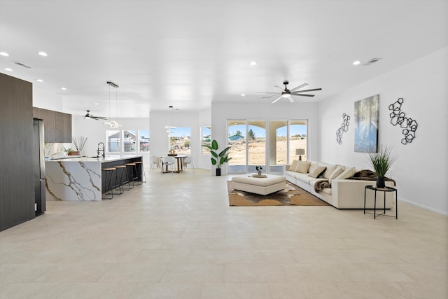 1145 15th St SE, Rio Rancho, NM 87124 - living room with sink and ceiling fan