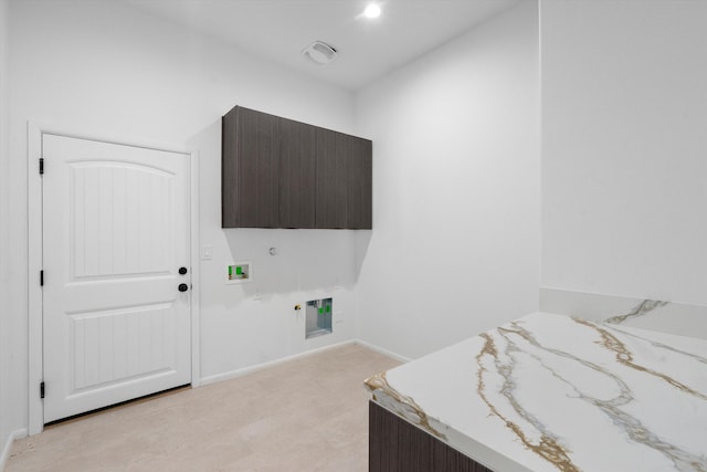 1145 15th St SE, Rio Rancho, NM 87124 - clothes washing area featuring cabinets, gas dryer hookup, hookup for a washing machine, and hookup for an electric dryer