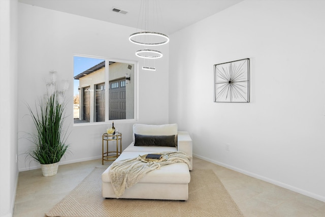 1145 15th St SE, Rio Rancho, NM 87124 - living area featuring a chandelier