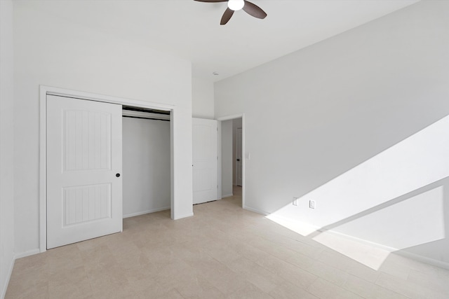 1145 15th St SE, Rio Rancho, NM 87124 - unfurnished bedroom featuring ceiling fan and a closet