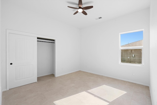 1145 15th St SE, Rio Rancho, NM 87124 - unfurnished bedroom with ceiling fan and a closet