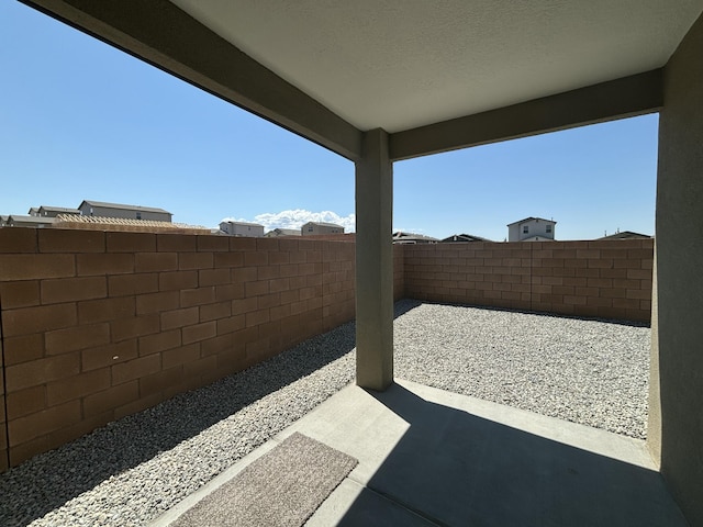 6232 Winter Hawk Dr NE, Rio Rancho, NM 87144 - view of patio with a fenced backyard