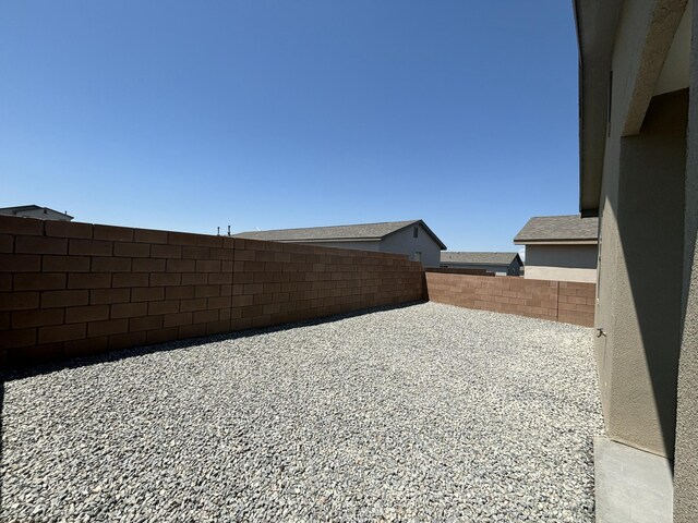 6232 Winter Hawk Dr NE, Rio Rancho, NM 87144 - view of yard featuring a patio and fence