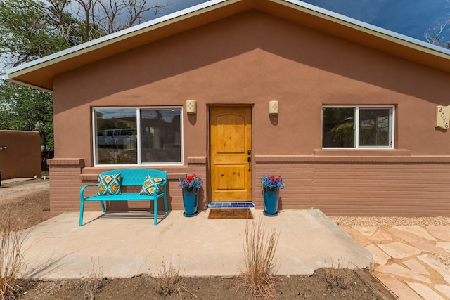 rear view of property with a patio area