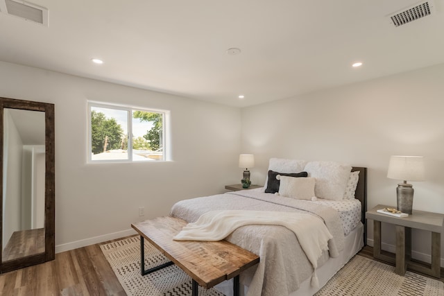 bedroom featuring light hardwood / wood-style flooring